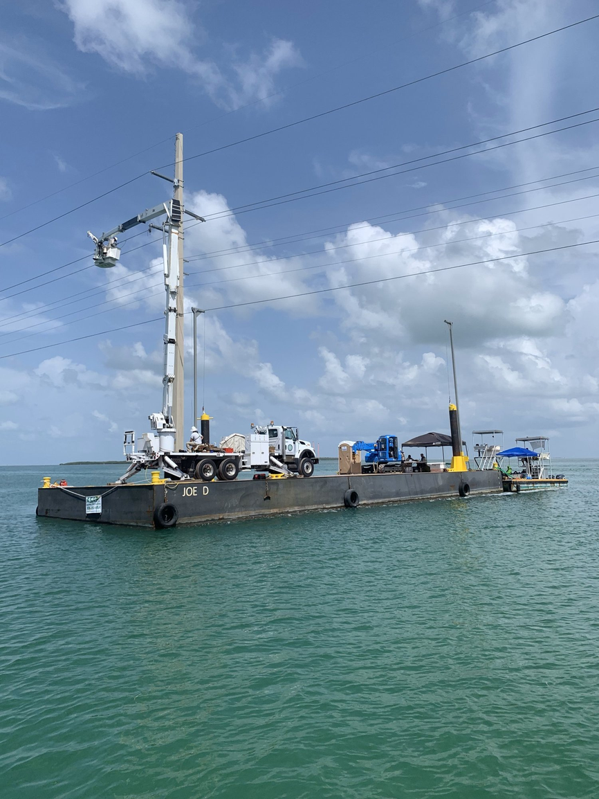 Upper Keys barge with crane on Florida waters