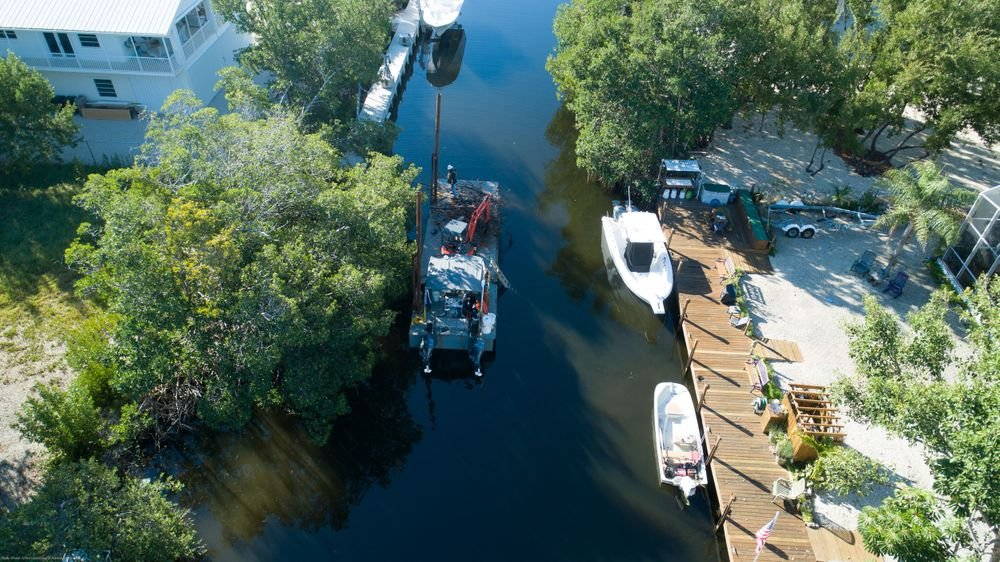 Aerial view of Florida Keys waterway with barge