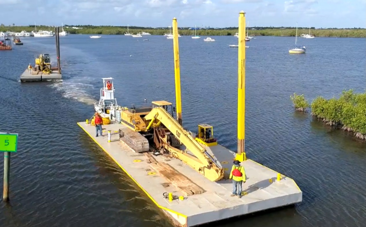 Work barge with excavator on Florida Keys waters